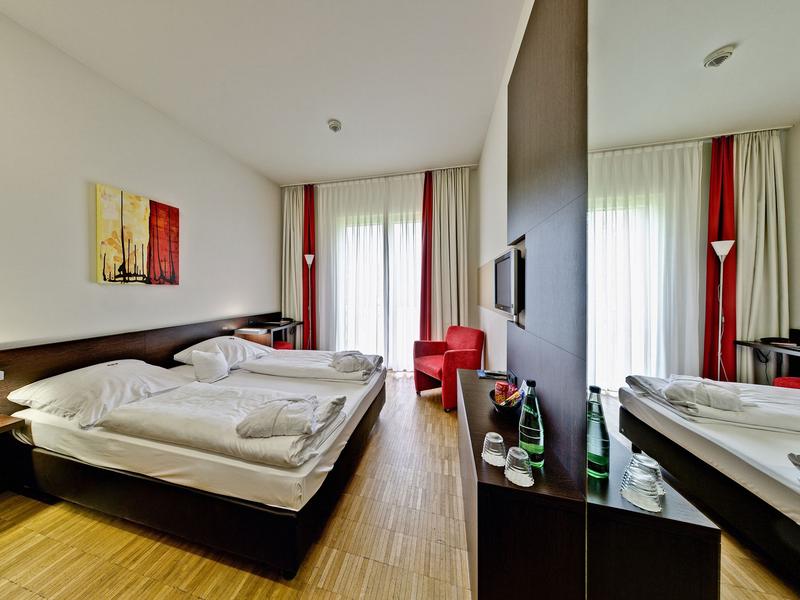 Zimmerbeispiel mit Doppelbett Santé Royale Hotel- & Gesundheitsresort